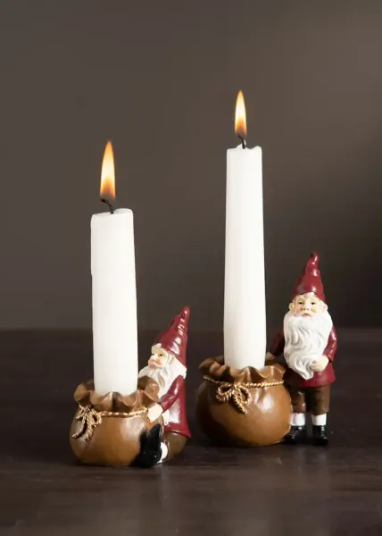 Lysestake nisse sittende 